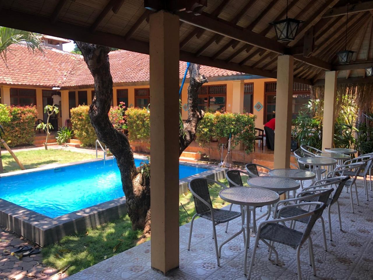 Mangga Bungalow Санур Экстерьер фото